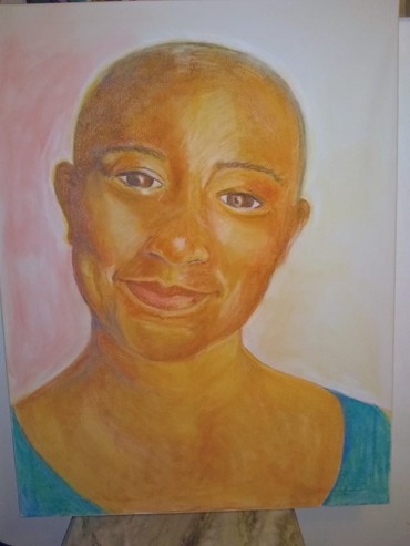 A pastel portrait of a woman, painted by the artist in residence