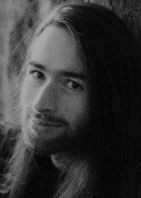 Black and white portrait photograph of musician Henry Tozer