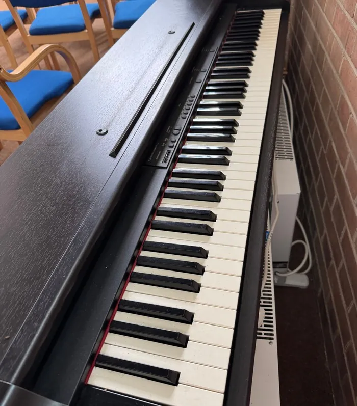 Close-up of the keys on the electric piano offered for a good home